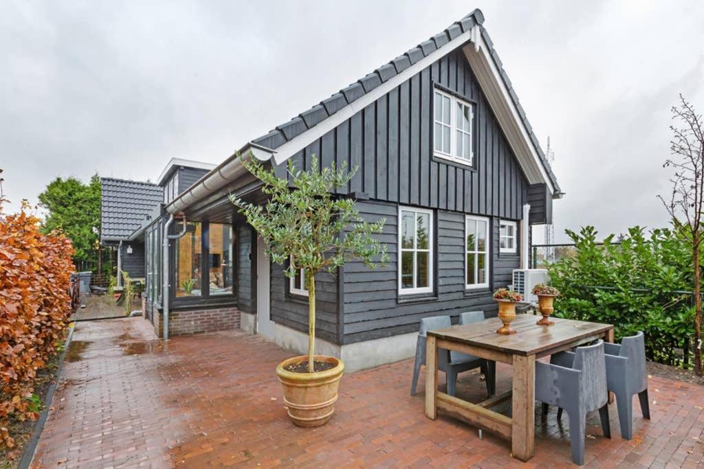 Uniek Houten Huis Nabij Bos En Plassen Hollandsche Rading Dış mekan fotoğraf